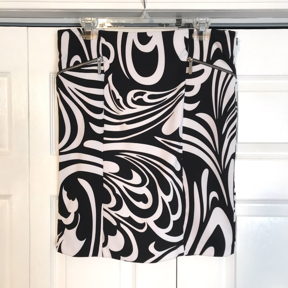 EUC Michael Kors skirt. Black and white/ form-fitting. Never worn. Size 12P.